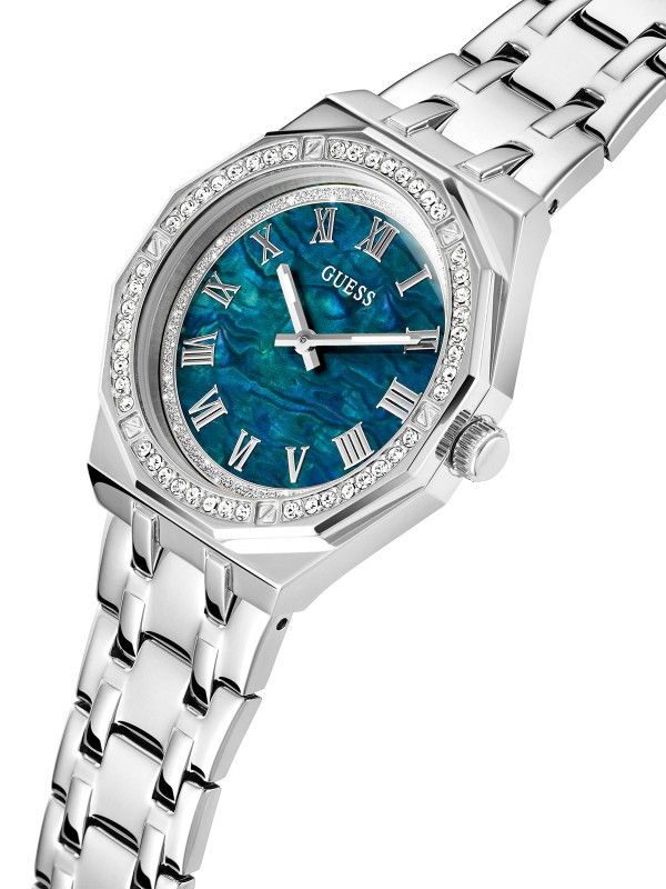 Elegantni Guess ženski sat sa cirkonima, plavim sedef brojčanikom i čeličnom narukvicom u boji srebra. Savršen za sofisticirane dame.