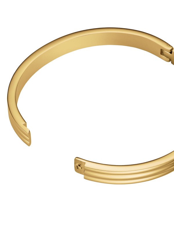 Elegantna Rosefield STRIPED BANGLE narukvica u boji žutog zlata, izrađena od nerđajućeg čelika, savršen detalj.