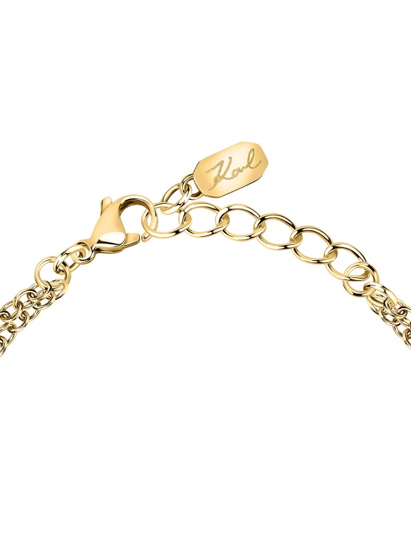 Karl Lagerfeld CRYSTALS narukvica KLAYC32 u boji žutog zlata, sa dva lančića i centralnim detaljem sa pavé cirkonima i Karl logoom. Dužina 16+3 cm.