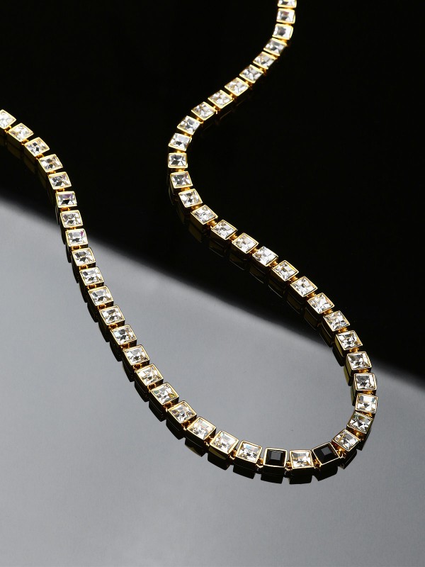 Karl Lagerfeld CRYSTALS ogrlica KLAYC04 – elegantna ženska tenis ogrlica od čelika u boji žutog zlata sa providnim i crnim kristalima. Dužina 40+2 cm.