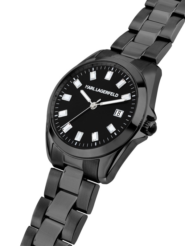 Karl Lagerfeld ROUND ESSENTIALS sat R0553101513 – elegantan ženski sat od nerđajućeg čelika u crnoj boji sa crnim sunray brojčanikom i baguette cirkonima kao markeri sati. Multifunkcijski prikaz datuma, vodootpornost do 50 m.