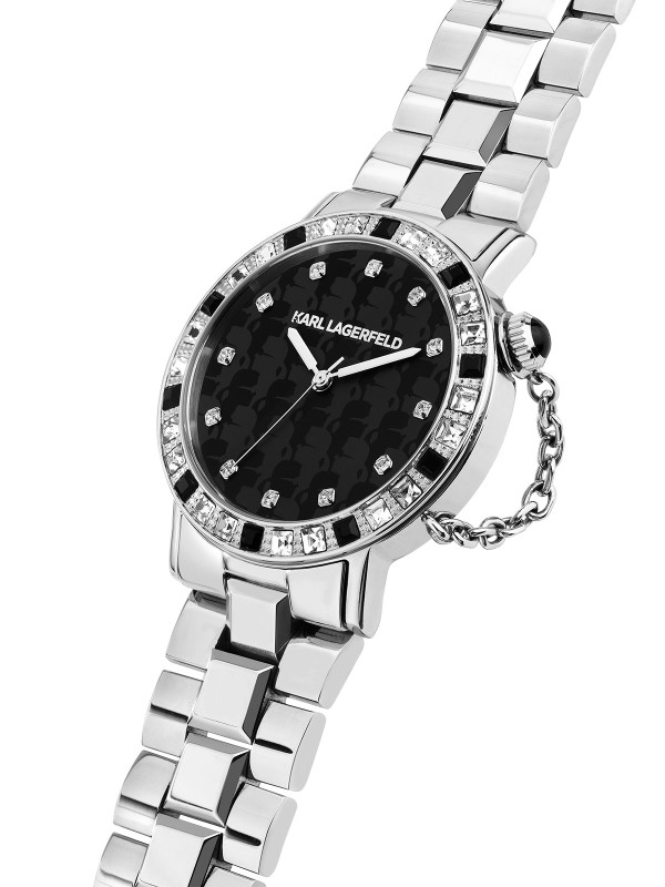 Karl Lagerfeld CRYSTALS sat R0553100502 – elegantan ženski sat u boji srebra sa crnim i providnim kristalima po ivici kućišta, crno‑sivim brojčanikom sa Karl portret printom. Vodootpornost do 50 m.