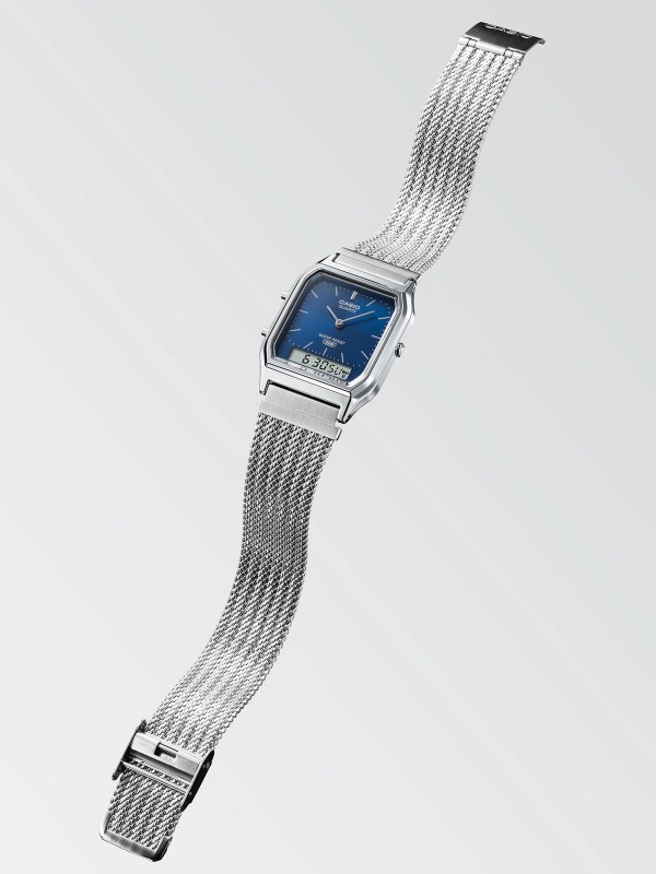 CASIO Vintage AQ-230EM-2AEF unisex sat sa mesh narukvicom i teget brojčanikom, analogno-digitalni prikaz, lagan, elegantan i praktičan za svaki dan.