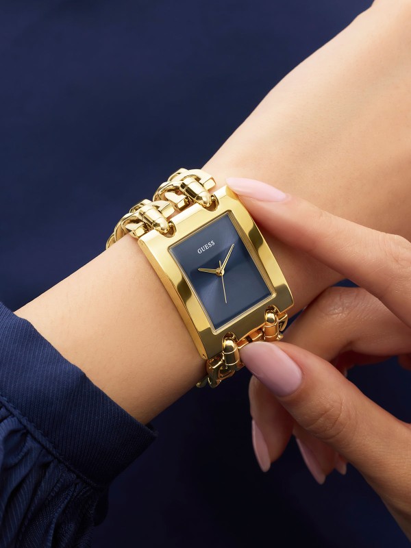 Guess Mod Heavy Metal GW0740L3 ženski elegantni sat u boji žutog zlata sa teget sunray brojčanikom. Moderan dizajn i izražen stil za svaki dan.