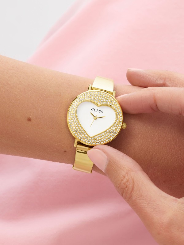 Guess Heartly GW0991L2 ženski trend sat u boji žutog zlata sa motivom srca i cirkonima. Elegantno-romantičan detalj za svaki dan.