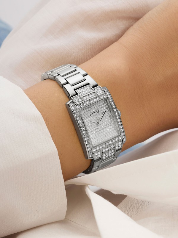 Guess Bonnet GW0995L1 ženski elegantni sat u srebrnoj boji sa pravougaonim kućištem i cirkonima. Kvarcni analogni mehanizam i čelična narukvica za sofisticiran izgled.