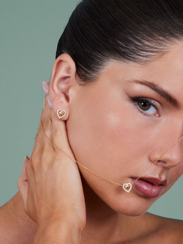 Elegantna GUESS ogrlica od srebra 925 s prevlakom od 18ct zlata i cirkonima, savršen izbor za savremene žene.
