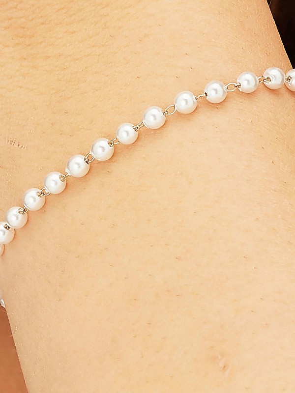 Brosway BNL078 ženska narukvica od nerđajućeg čelika u boji žutog zlata sa biserima. Dužina 20cm. Elegantna narukvica za svakodnevno nošenje ili poklon.