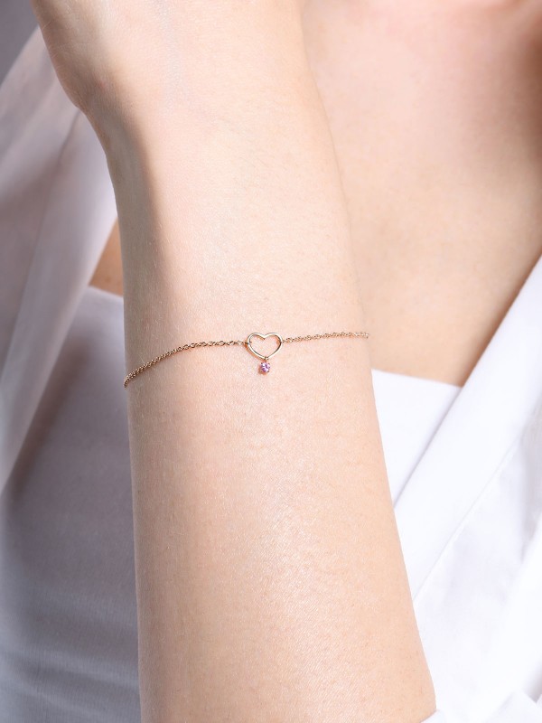 BURATO BLUE HEART narukvica od 18ct roze zlata s roze safirom. Podesiva dužina, elegantan dizajn, savršen poklon za svaku priliku.