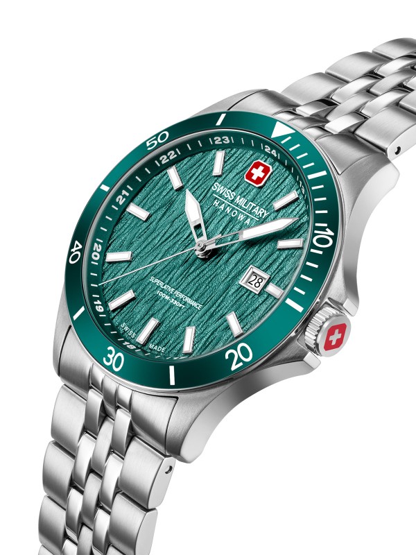 SWISS MILITARY HANOWA FLAGSHIP ELEMENTS EARTH SMWGH0006704 – Swiss Made muški sportski sat koji simbolizuje snagu i stabilnost prirode kroz dizajn inspirisan elementom zemlje. Kućište od nerđajućeg čelika prečnika 42 mm i hidraulično utisnuti zeleni brojčanik predstavljaju spoj robusnosti i elegancije. Opremljen safirnim staklom, kvarcnim mehanizmom Ronda 505 sa funkcijom datuma i vodootpornošću do 100 metara, ovaj sat u potpunosti oslikava duh kolekcije Flagship Elements.