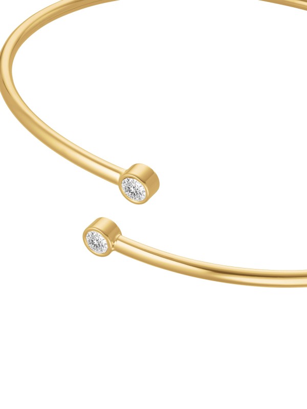 Zasijajte uz Rosefield JBDCG-J1213 narukvicu u boji žutog zlata. Dva besprekorna bela cirkona na krajevima donose suptilan sjaj i eleganciju svakom pokretu. Savršena za žene koje biraju luksuz u jednostavnosti.