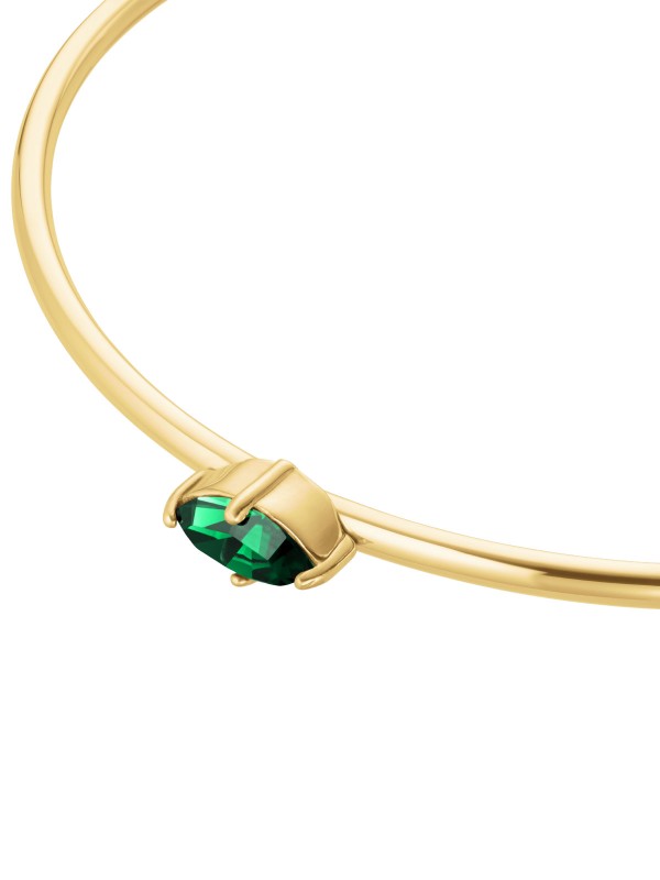 Rosefield JBEMG-J1242 – sofisticirana ženska narukvica od nerđajućeg čelika sa otvorenim krajevima u boji žutog zlata, ukrašena zelenim cirkonom. Veličina: 6 cm x 5 cm. Savršen dodatak za elegantan i prefinjen stil.