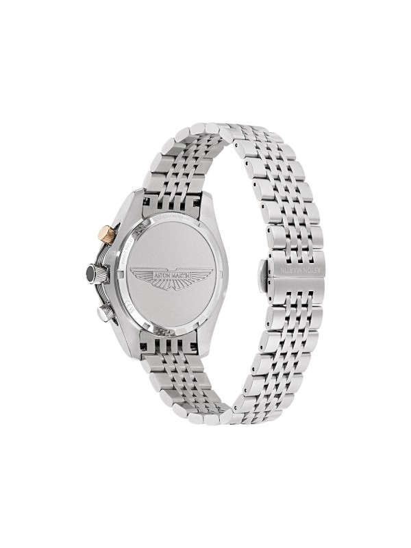 Aston Martin MTRS1F504 – luksuzni muški hronograf koji kombinuje sportski karakter i sofisticiran dizajn. Kućište od nerđajućeg čelika prečnika 42mm, beli brojčanik i tahimetarska skala u boji roze zlata donose eleganciju sa trkačkim duhom. Narukvica od čelika u boji srebra, mineralno staklo sa safirnom prevlakom i vodootpornost 100m čine ovaj sat savršenim izborom za savremenog muškarca.