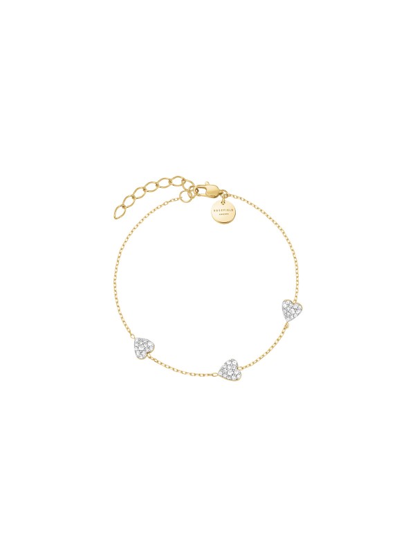 Nežna narukvica u zlatnom tonu sa tri viseća srca. Privesci ukrašeni cirkonima čine ovaj nakit od čelika elegantnim i razigranim.