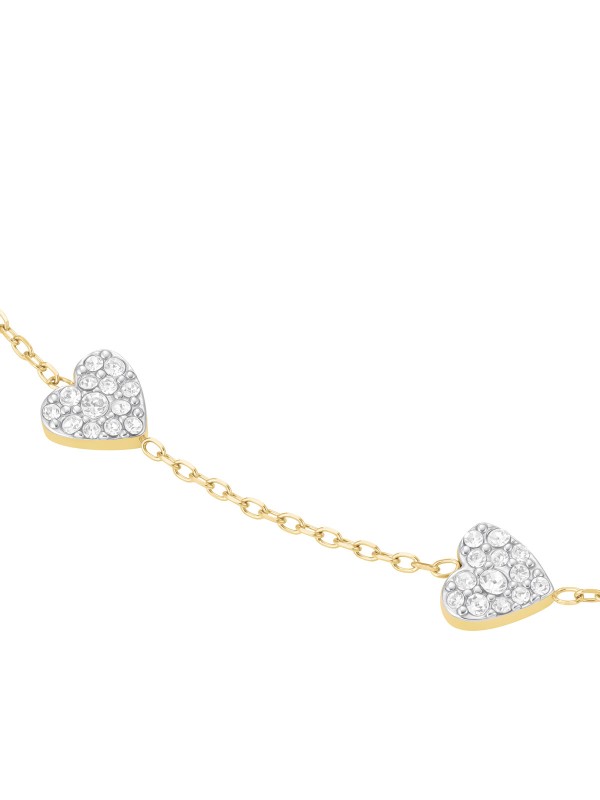 Nežna narukvica u zlatnom tonu sa tri viseća srca. Privesci ukrašeni cirkonima čine ovaj nakit od čelika elegantnim i razigranim.