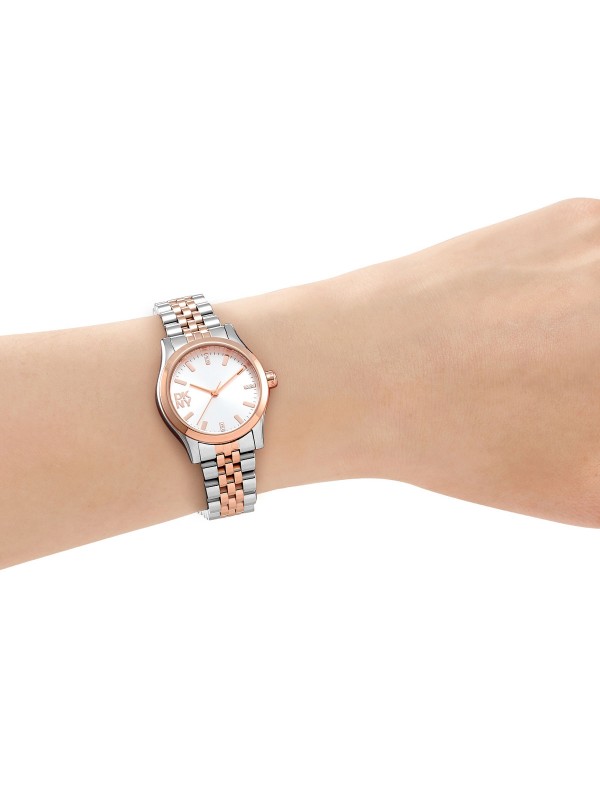 DKNY ženski sat od 28 mm u kombinaciji srebra i roze zlata sa cirkonima. Moderan i elegantan dizajn. Naruči online!