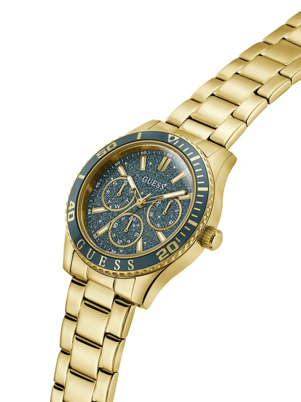 Glamurozan GUESS Mariana ženski sat od 36mm. Zlatni ton sa zelenim sjajnim brojčanikom, zelenom koronom i multifunkcionalnim mehanizmom. Vodootporan do 30m.
