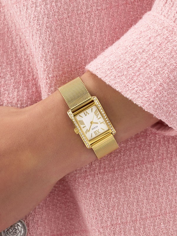 Elegantan GUESS Bonnet ženski sat pravougaonog oblika. Kućište od 23mm u zlatnom tonu sa cirkonima i mesh narukvicom. Beli brojčanik i vodootpornost do 30m.