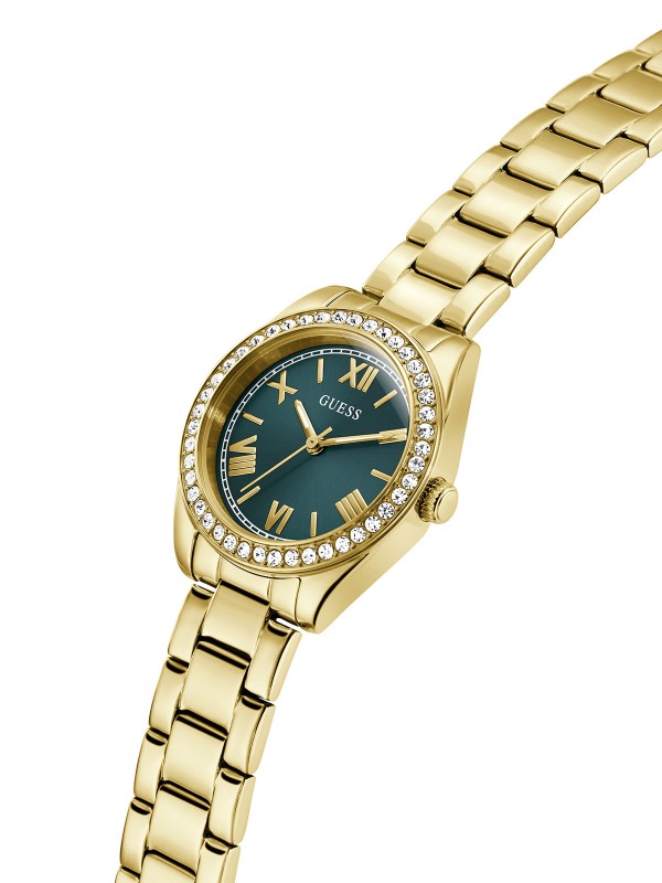 Elegantan GUESS Mini Luna ženski sat prečnika 30mm. Kućište i narukvica u zlatnom tonu sa cirkonima i plavozelenim brojčanikom. Vodootporan do 30m.