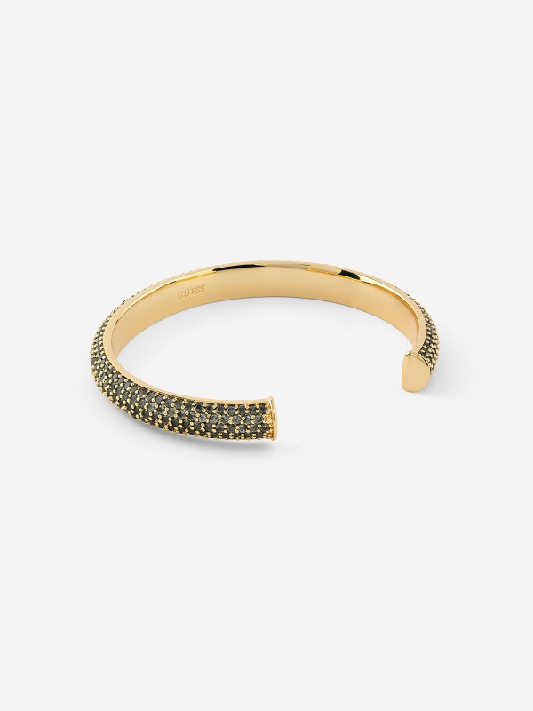 Ženska narukvica od legure metala u boji žutog zlata sa crnim cirkonima. Elegantna i čvrsta, savršena za svaku priliku. Kupite odmah online!