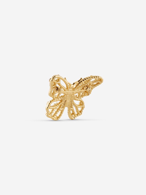 Guess ženski broš od nerđajućeg čelika u boji žutog zlata sa bisernim perlama. Elegantni leptir dizajn za svaku priliku. Kupite odmah online!