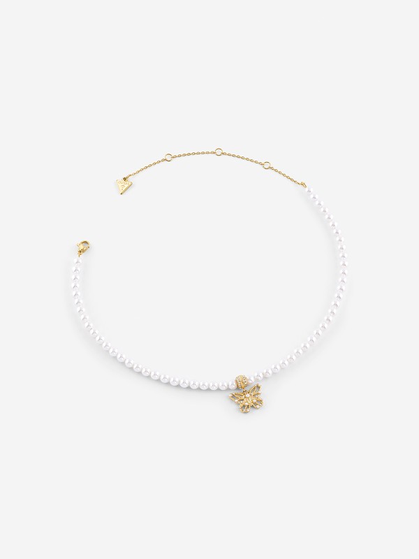 Guess ženska ogrlica od nerđajućeg čelika u boji žutog zlata sa bisernim perlama. Elegantna i podesiva. Poručite online i istaknite svoj stil!