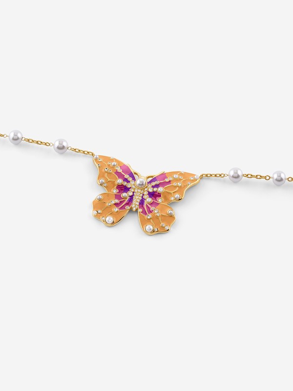 Guess ženska ogrlica od nerđajućeg čelika u boji žutog zlata sa bisernim perlama i leptir detaljem. Elegantna i podesiva. Kupite odmah online!
