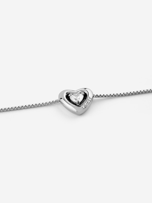 Guess ženska narukvica od nerđajućeg čelika u boji srebra sa cirkonskim srcem. Elegantna i podesiva. Poručite online i istaknite svoj stil!