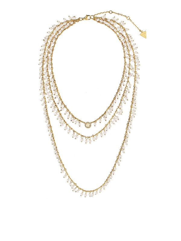 Guess ženska ogrlica Portovenere u boji žutog zlata sa belim perlicama i višerednim dizajnom. Elegantni statement komad za sofisticirane kombinacije.